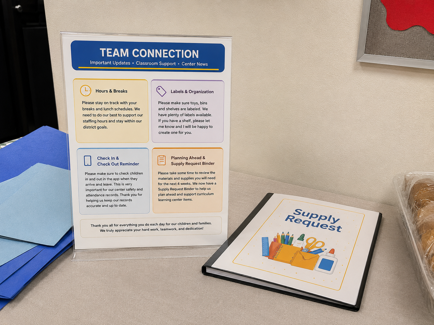 Team Connection board and the Supply Request binder in place in the center's staff area
