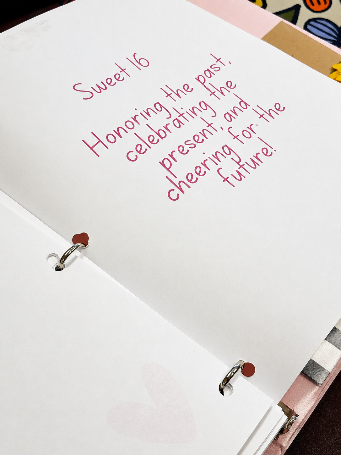 Handwritten Sweet 16 binder page reading honoring the past, celebrating the present, cheering for the future